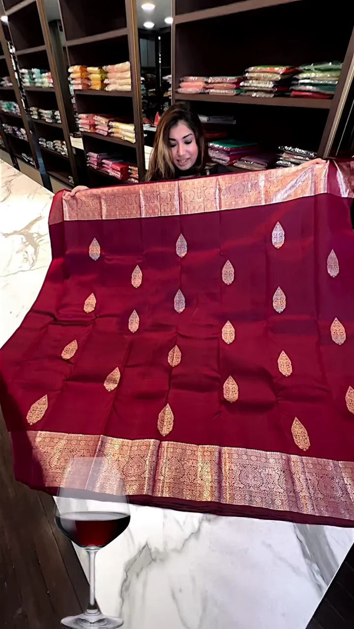 Ephemeral Wine Soft Banarasi Silk Saree With Extraordinary Blouse Piece