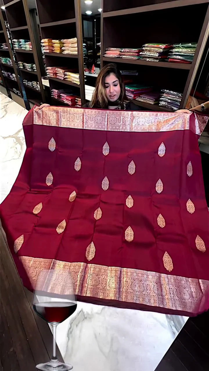 Ephemeral Wine Soft Banarasi Silk Saree With Extraordinary Blouse Piece