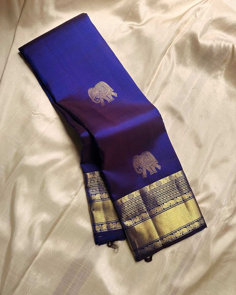 Cynosure Royal Blue Soft Banarasi Silk Saree With Stunning Blouse Piece