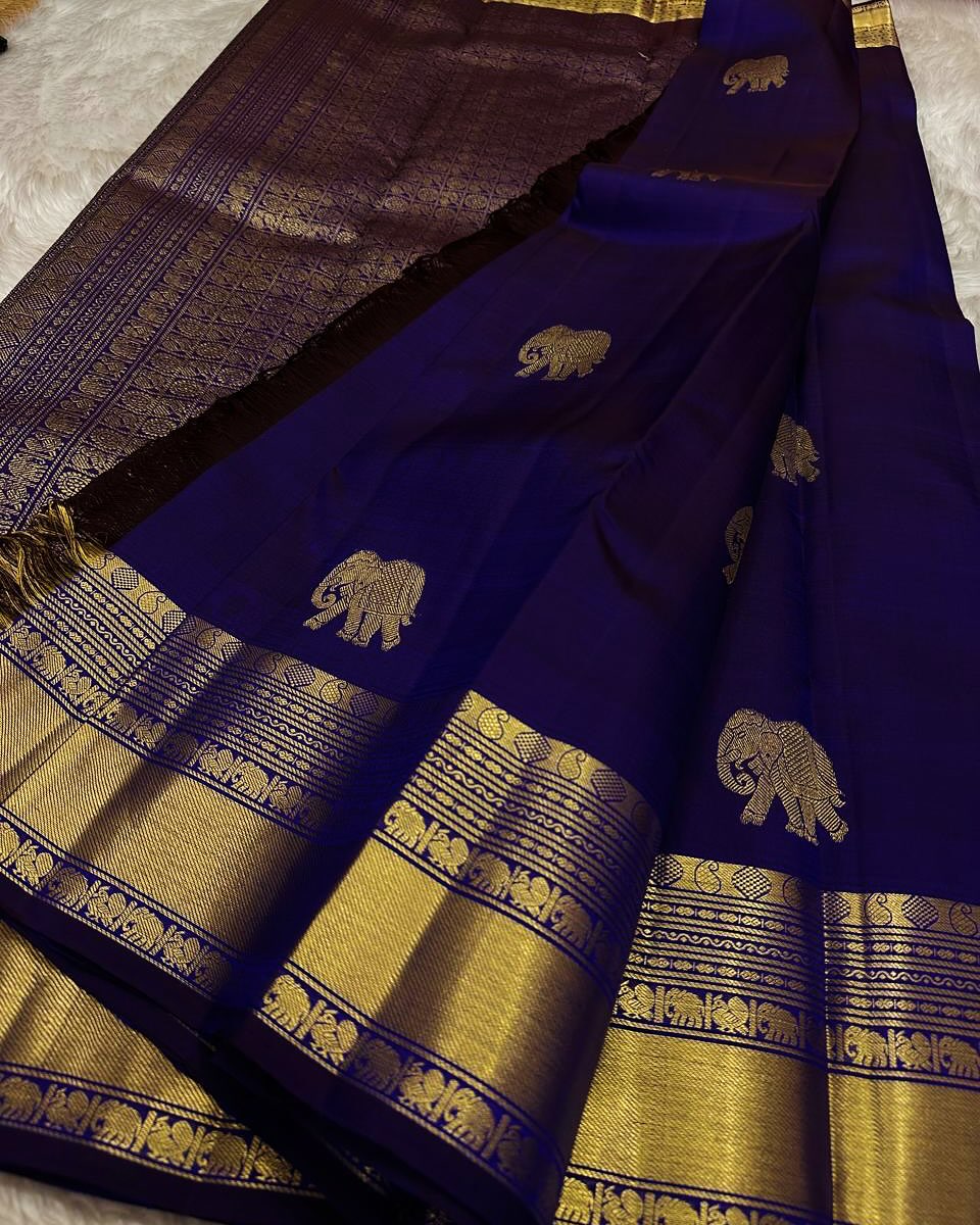 Cynosure Royal Blue Soft Banarasi Silk Saree With Stunning Blouse Piece