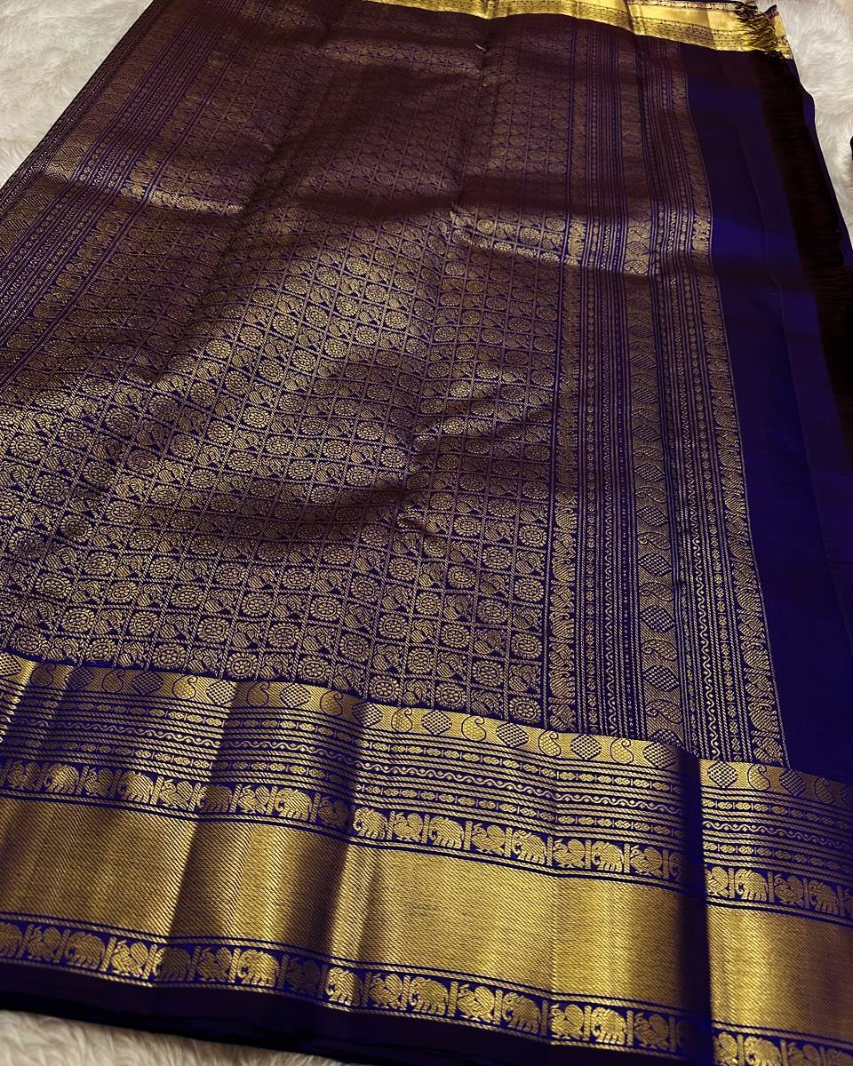 Cynosure Royal Blue Soft Banarasi Silk Saree With Stunning Blouse Piece