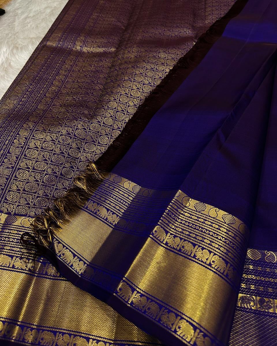 Cynosure Royal Blue Soft Banarasi Silk Saree With Stunning Blouse Piece