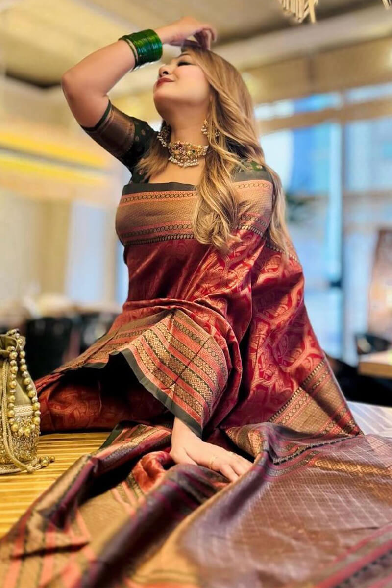 Evanescent Maroon Soft Silk Saree With Extraordinary Blouse Piece