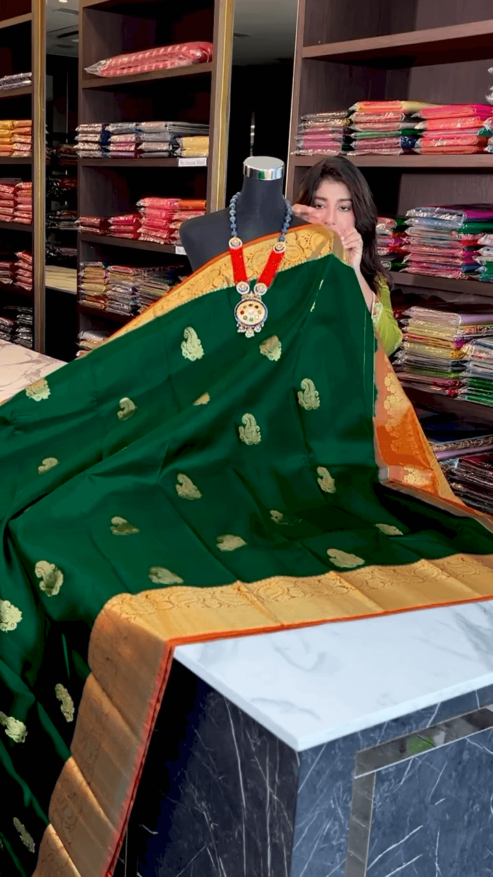 Fairytale Dark Green Soft Banarasi Silk Saree With Amiable Blouse Piece