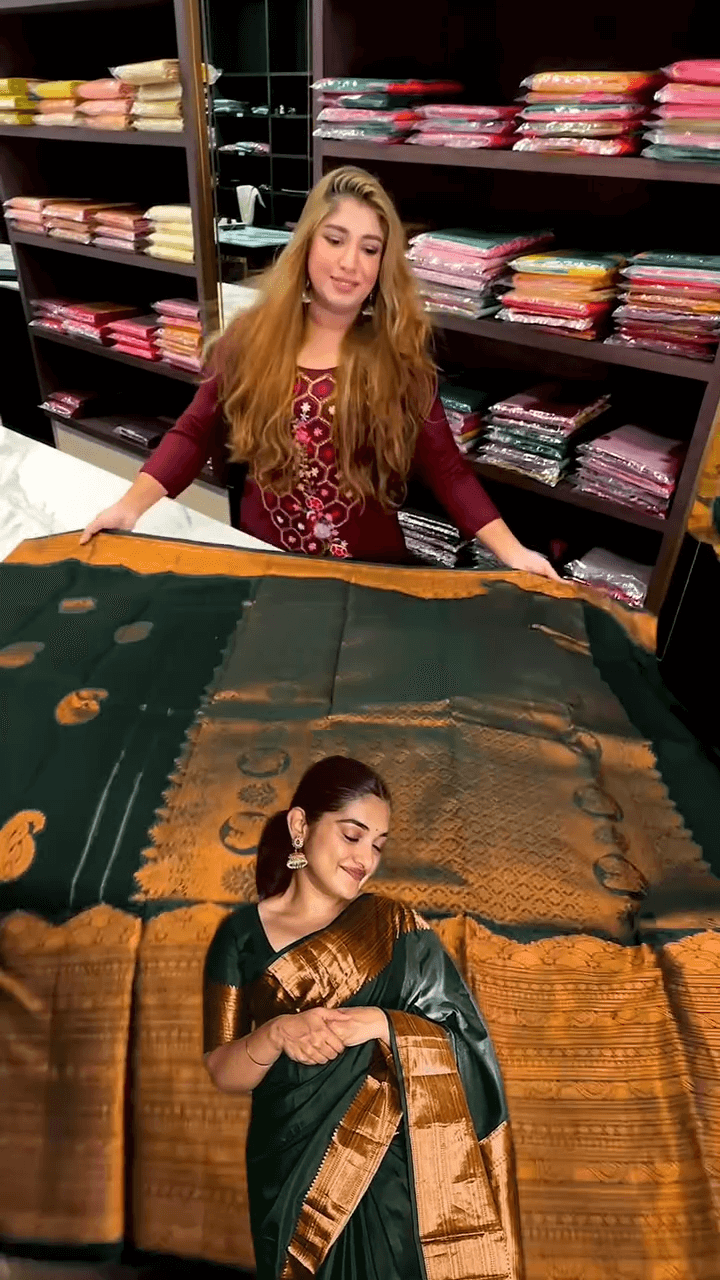 Ornate Dark Green Soft Banarasi Silk Saree With Wonderful Blouse Piece