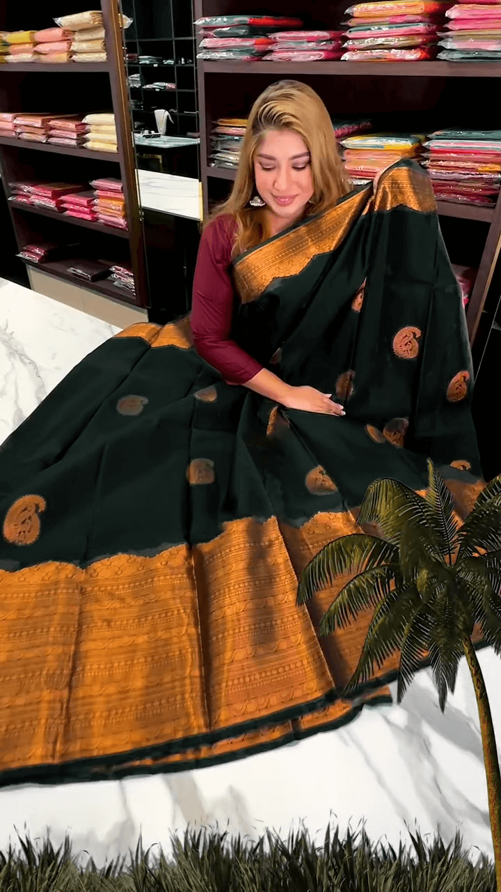Ornate Dark Green Soft Banarasi Silk Saree With Wonderful Blouse Piece