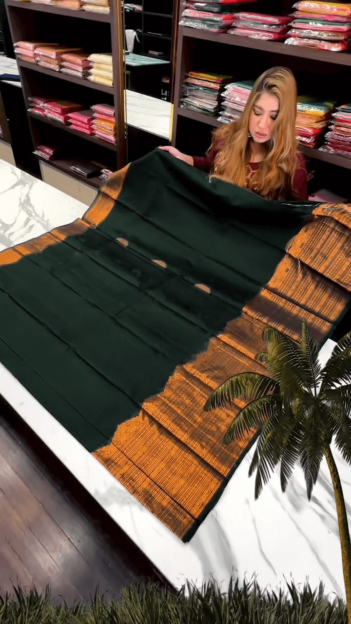 Ornate Dark Green Soft Banarasi Silk Saree With Wonderful Blouse Piece