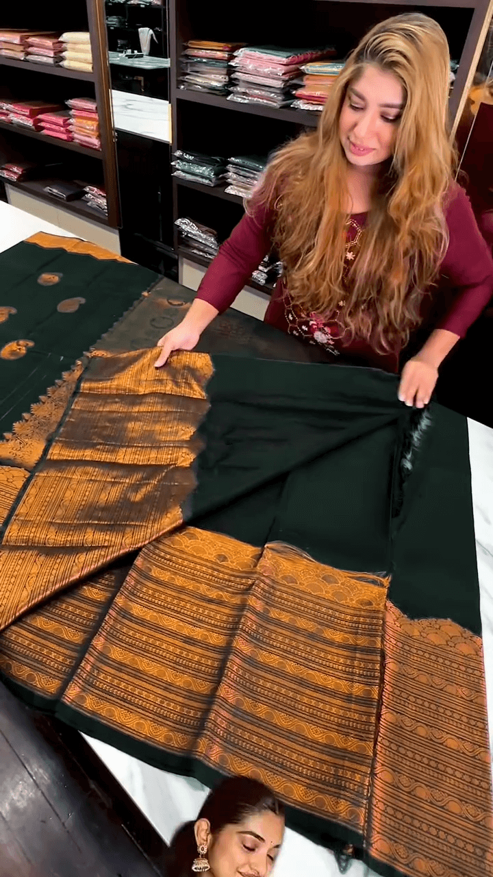 Ornate Dark Green Soft Banarasi Silk Saree With Wonderful Blouse Piece