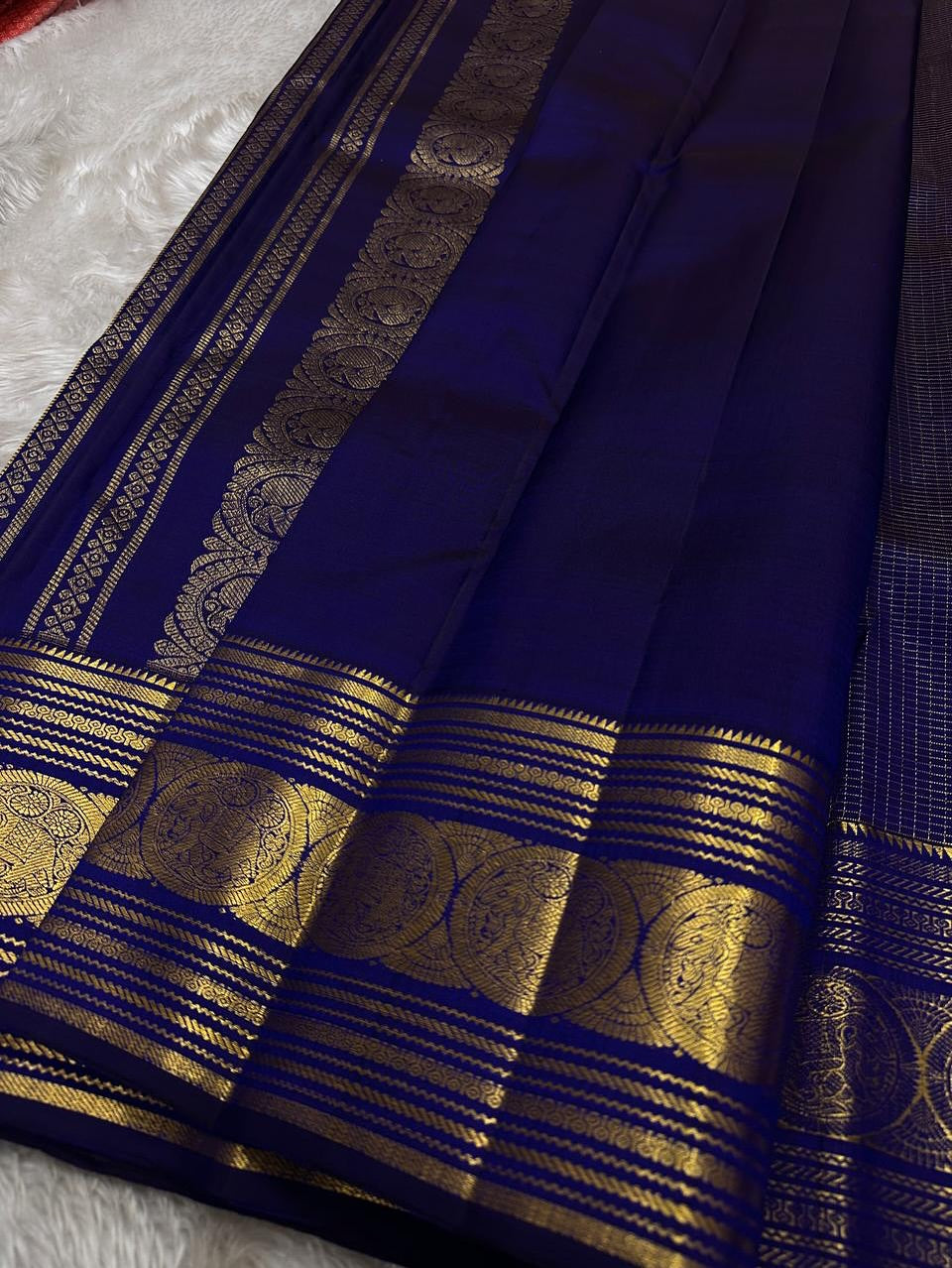Adorning Navy Blue Soft Banarasi Silk Saree With Engaging Blouse Piece