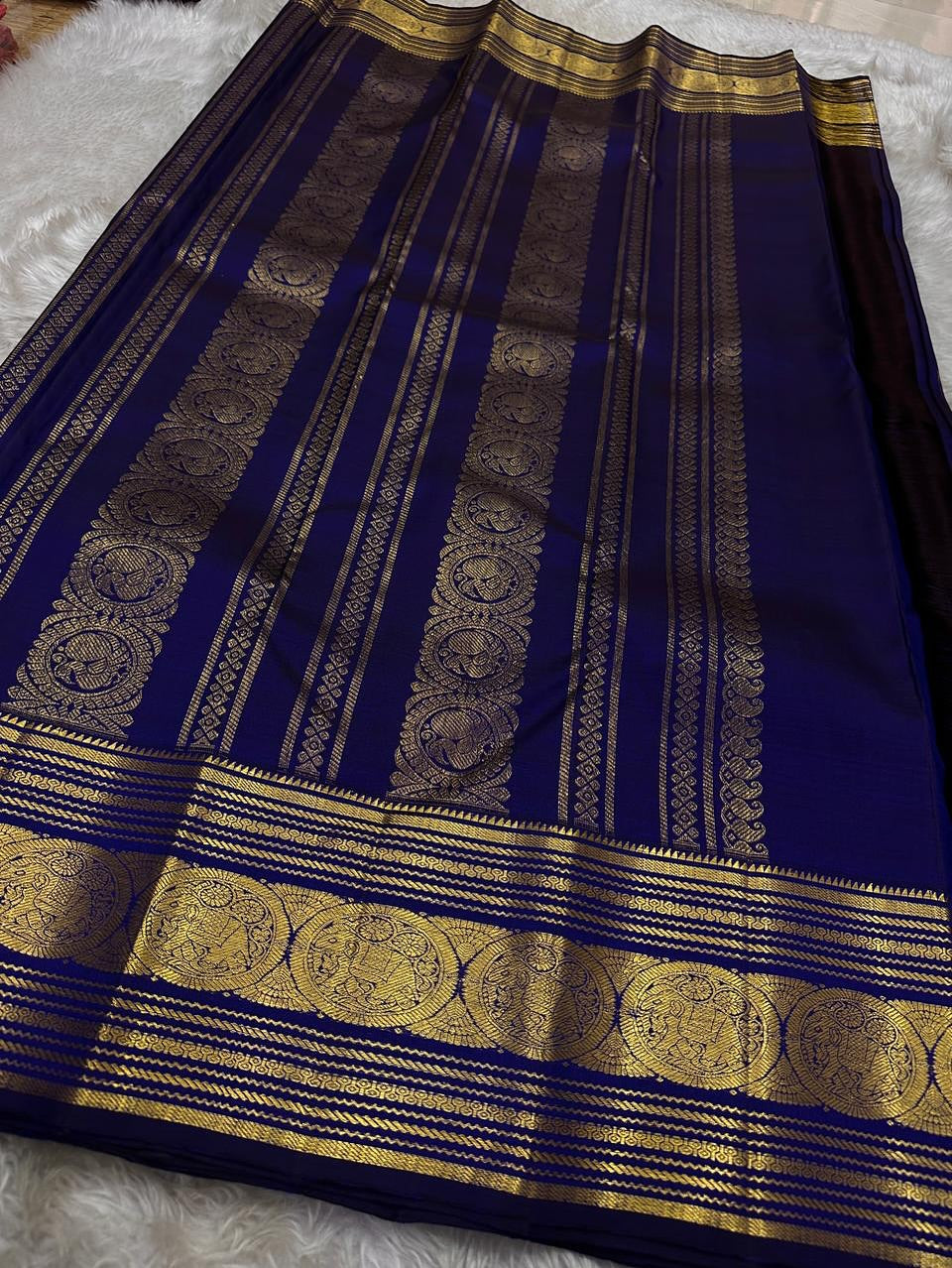 Adorning Navy Blue Soft Banarasi Silk Saree With Engaging Blouse Piece
