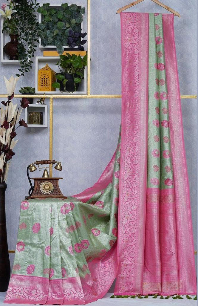 Divine Sea Green Soft Silk Saree With Snazzy Blouse Piece