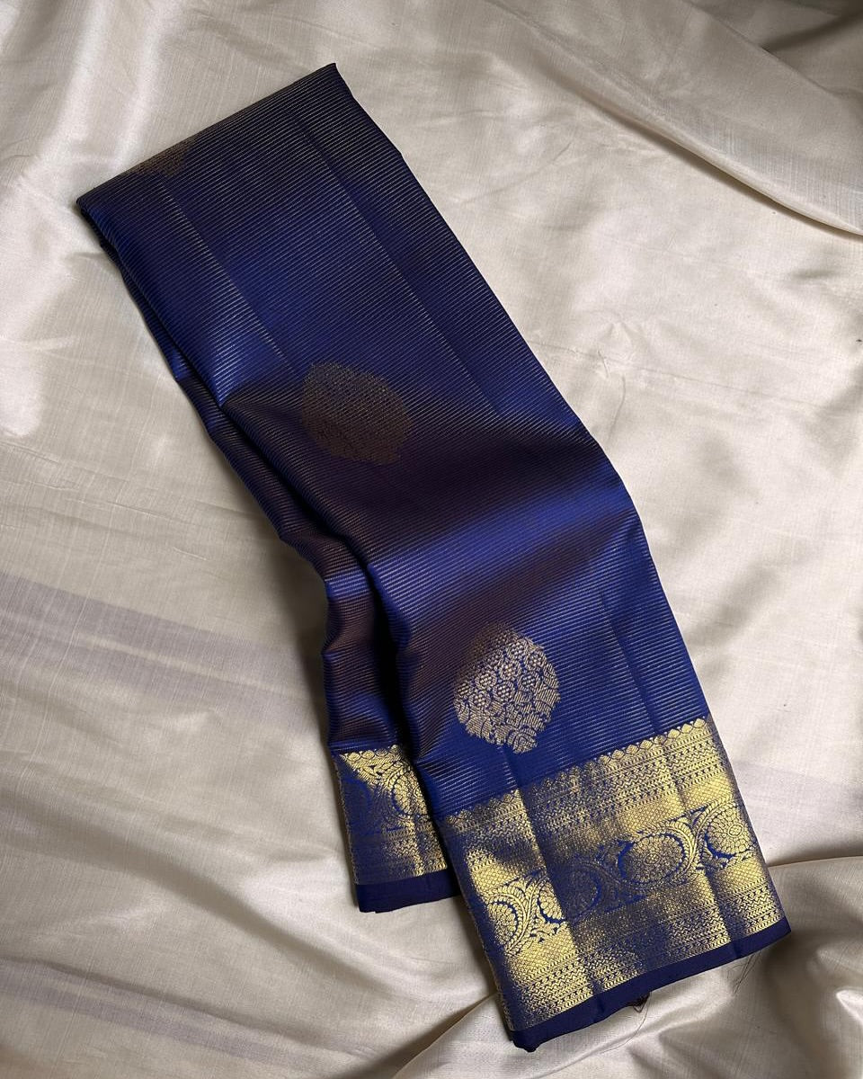Adorning Navy Blue Soft Banarasi Silk Saree With Resplendent Blouse Piece