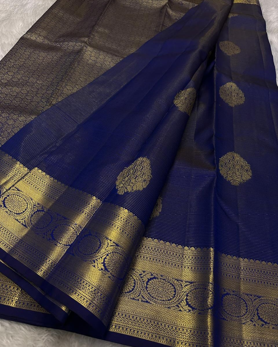 Adorning Navy Blue Soft Banarasi Silk Saree With Resplendent Blouse Piece