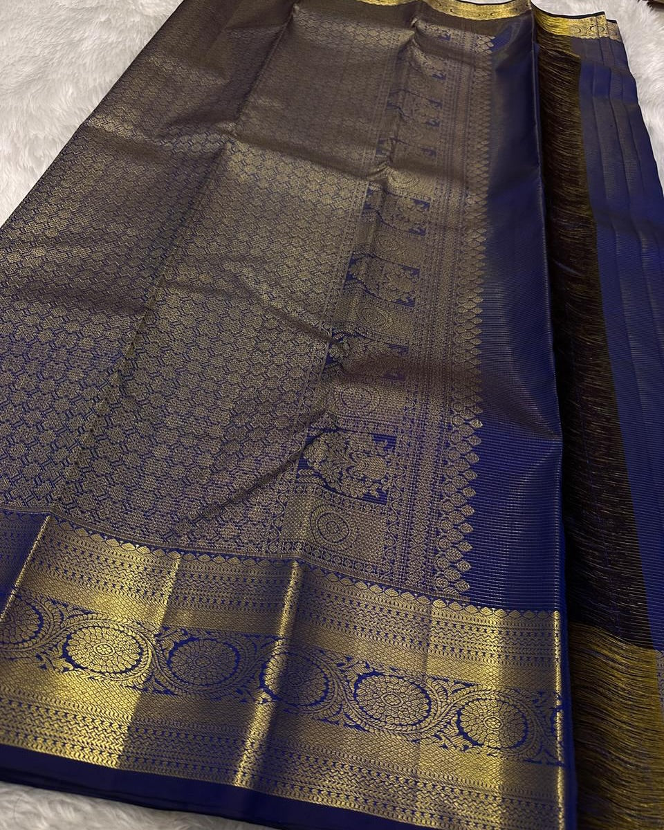 Adorning Navy Blue Soft Banarasi Silk Saree With Resplendent Blouse Piece