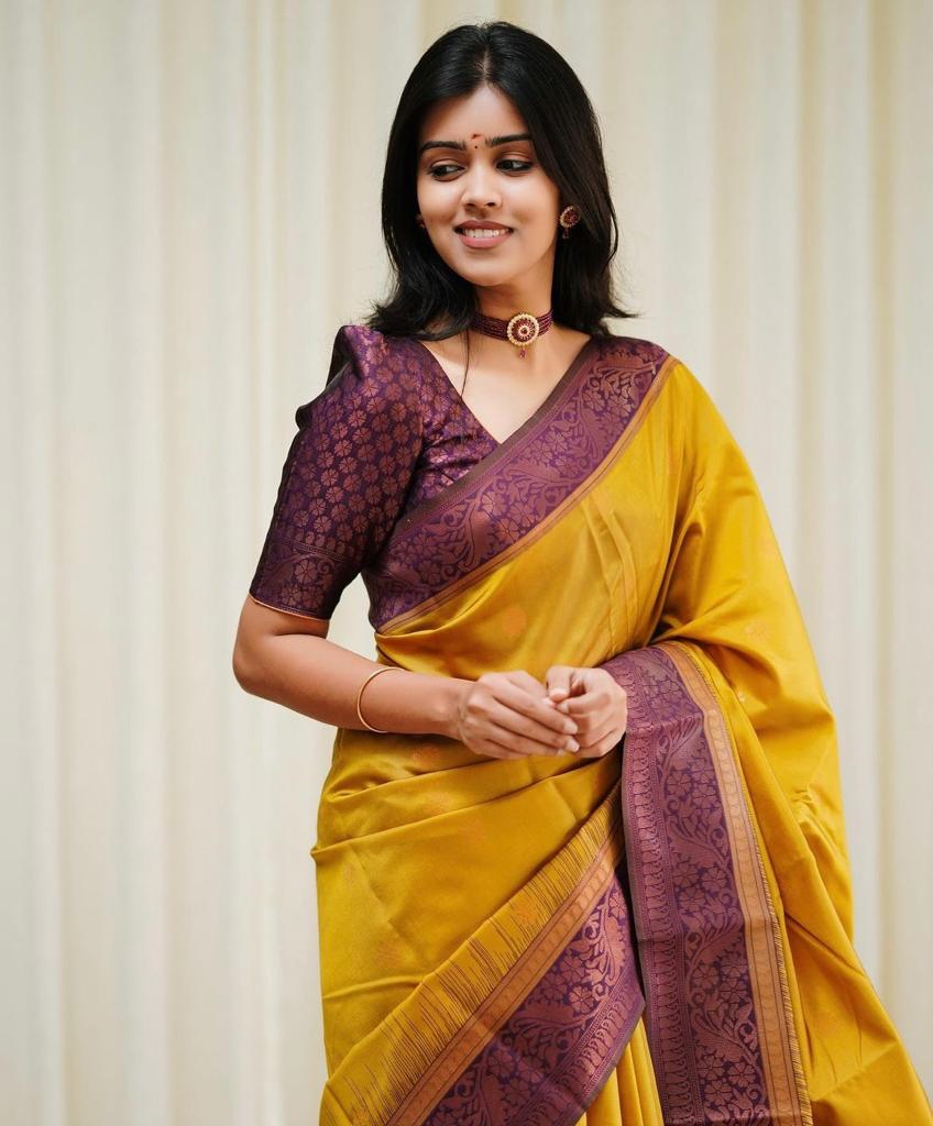Flamboyant Yellow Soft Silk Saree With Flattering Blouse Piece