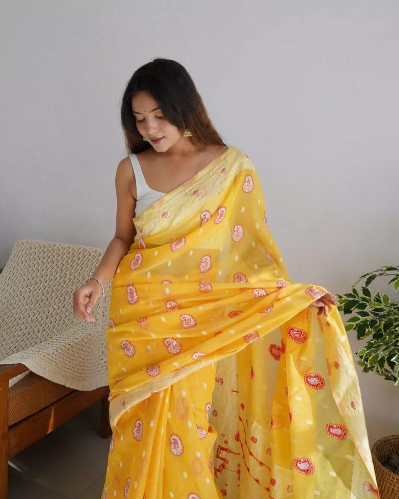 Prominent Yellow Cotton Silk Saree With Gleaming Blouse Piece