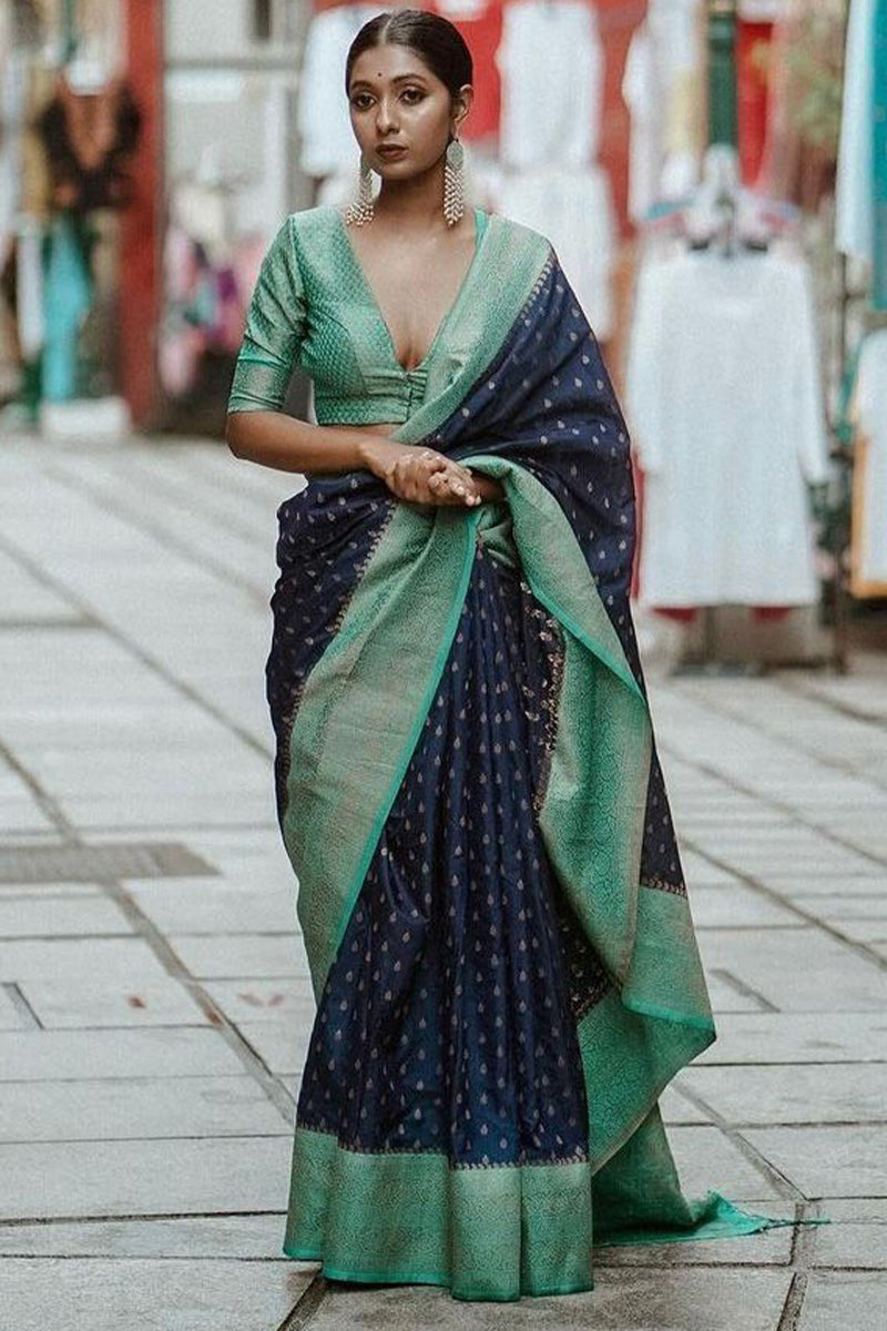 Deserving Navy Blue Soft Silk Saree With Hypnotic Blouse Piece
