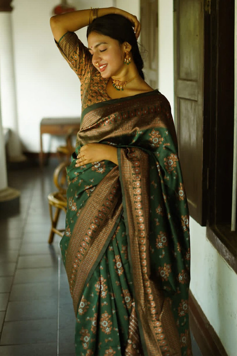 Phenomenal Green Soft Silk Saree With Twirling Blouse Piece