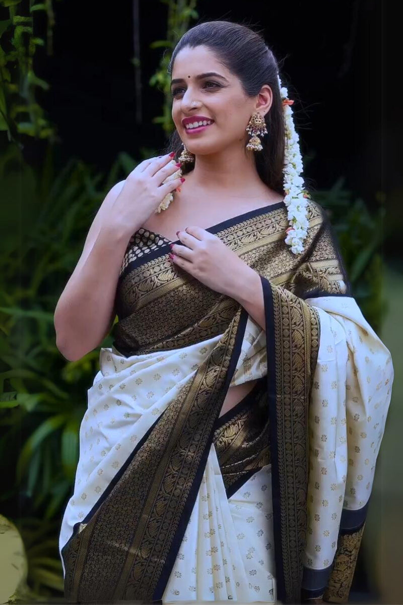 Gratifying Off White Soft Silk Saree With Surpassing Blouse Piece