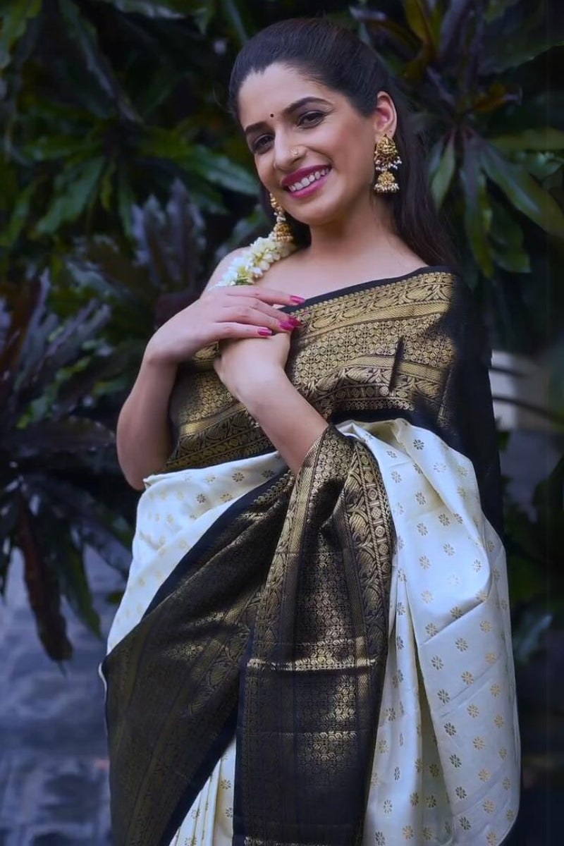 Gratifying Off White Soft Silk Saree With Surpassing Blouse Piece