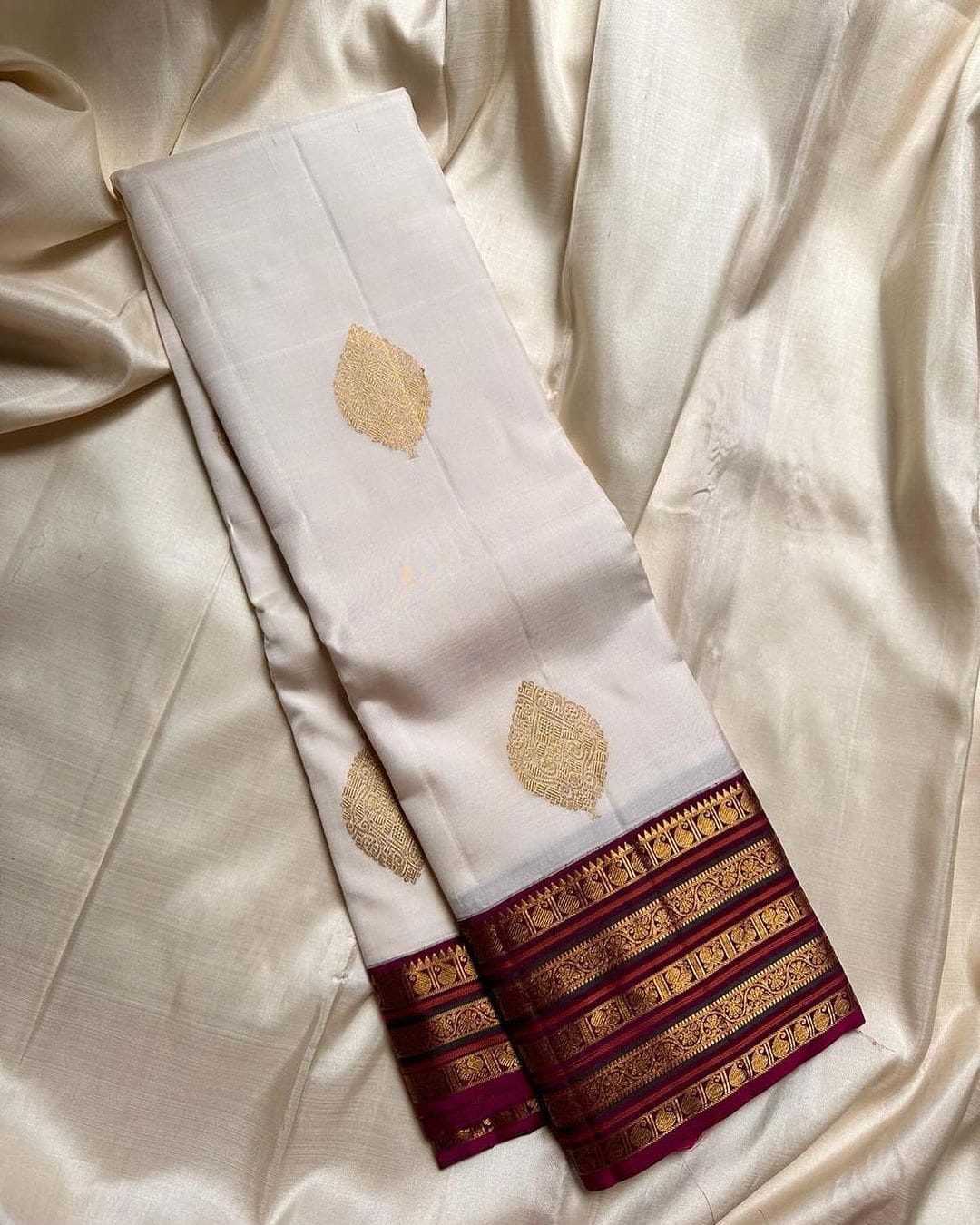 Embrocation Off White Soft Silk Saree With Phenomenal Blouse Piece