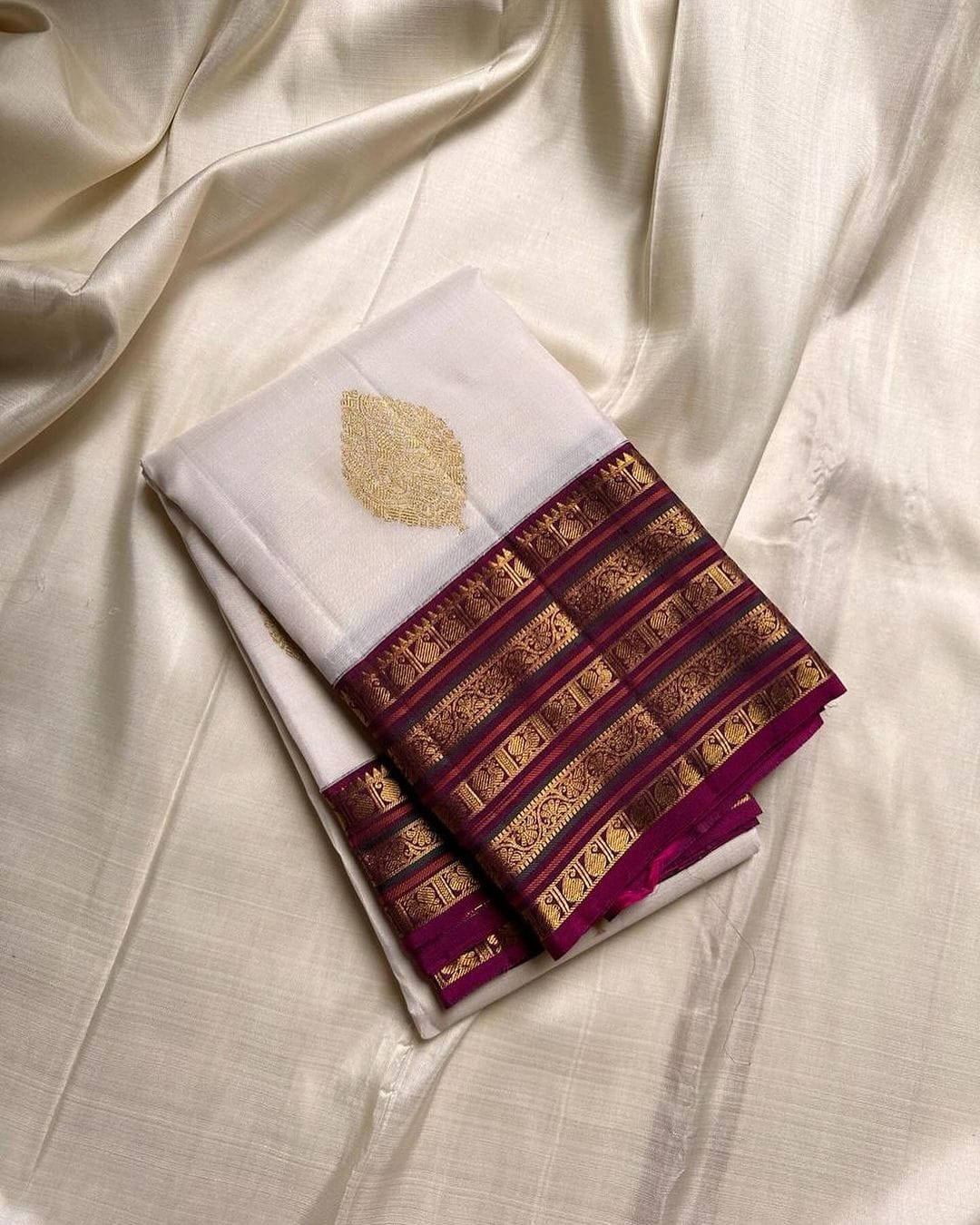 Embrocation Off White Soft Silk Saree With Phenomenal Blouse Piece