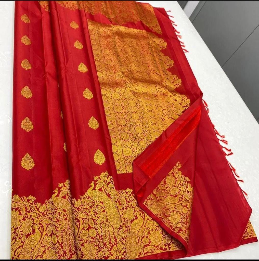 Ravishing Red Soft Banarasi Silk Saree With Pleasurable Blouse Piece