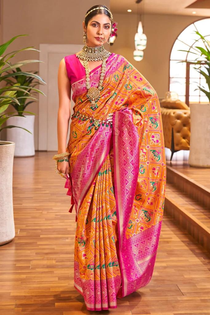 Gorgeous Orange Patola Silk Saree with Forbearance Blouse Piece