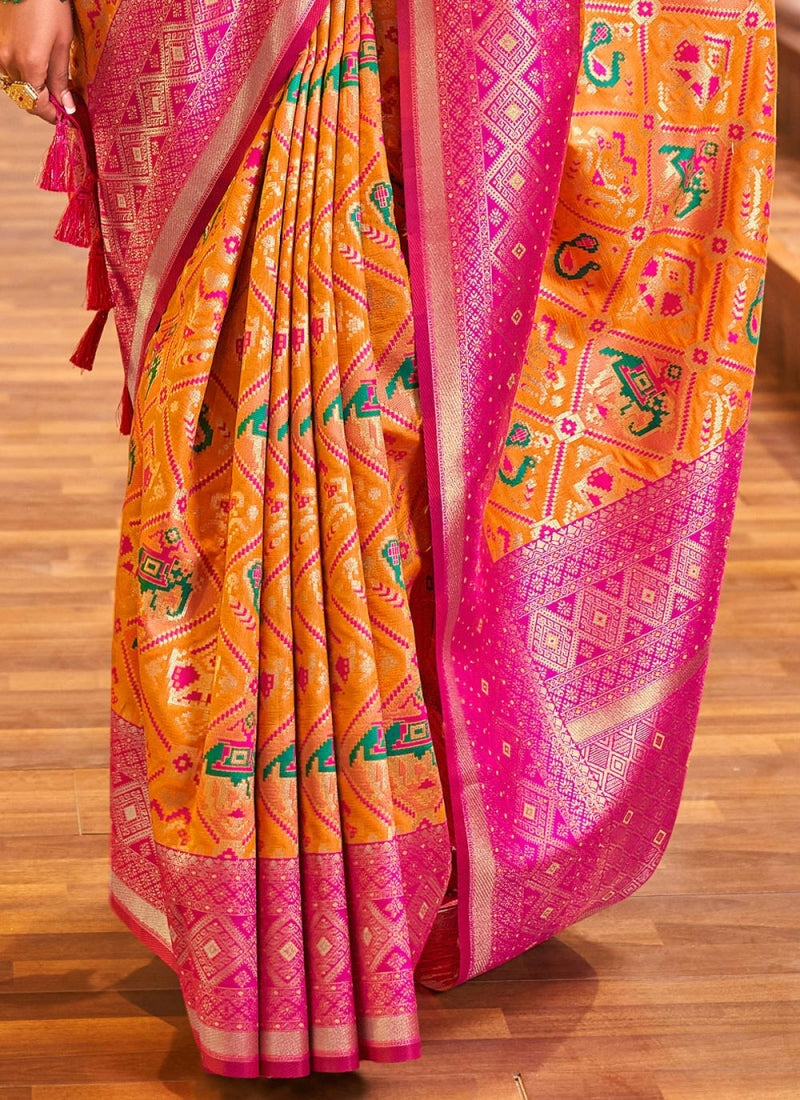 Gorgeous Orange Patola Silk Saree with Forbearance Blouse Piece