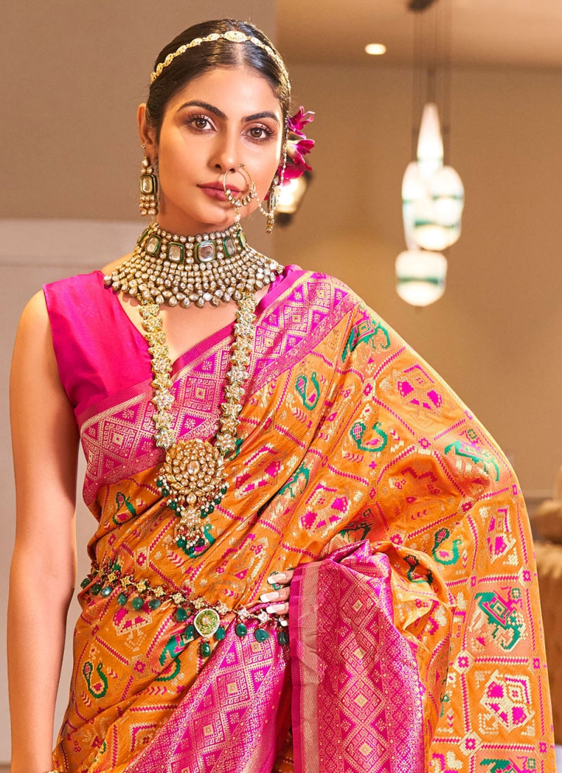 Gorgeous Orange Patola Silk Saree with Forbearance Blouse Piece