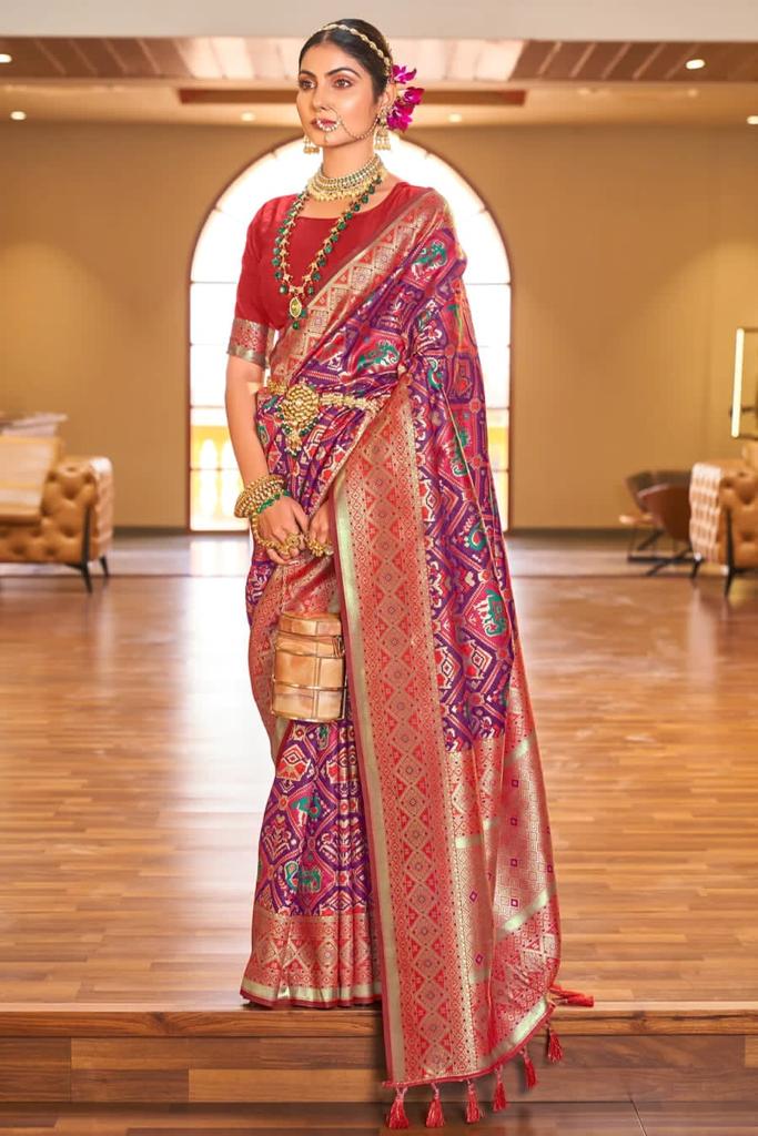 Flaunt Purple Patola Silk Saree with Incomparable Blouse Piece