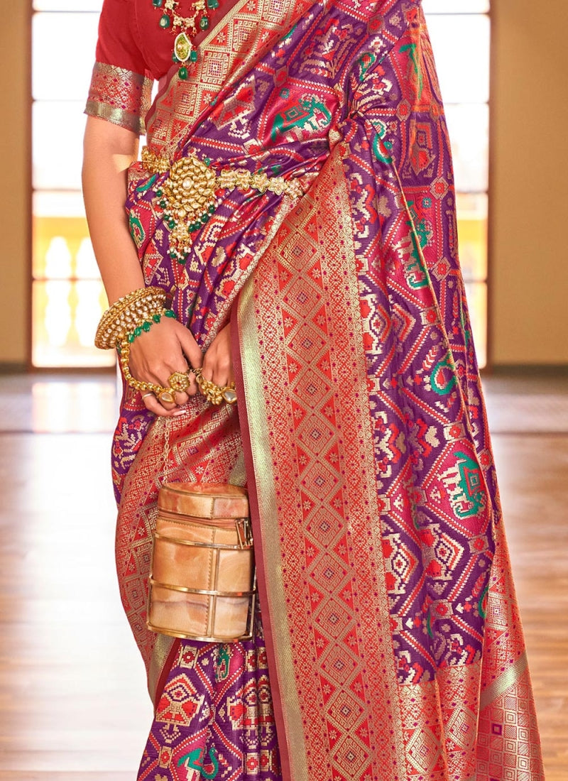 Flaunt Purple Patola Silk Saree with Incomparable Blouse Piece