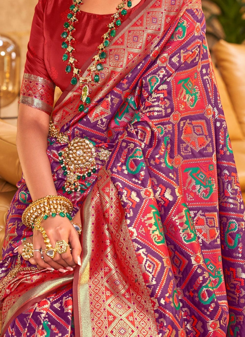 Flaunt Purple Patola Silk Saree with Incomparable Blouse Piece