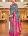 Sensational Turquoise Patola Silk Saree with Felicitous Blouse Piece