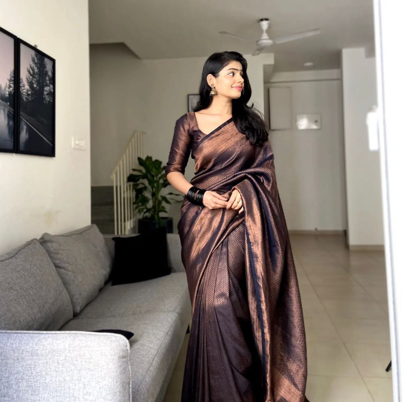 Whimsical Black Soft Banarasi Silk Saree With Elaborate Blouse Piece