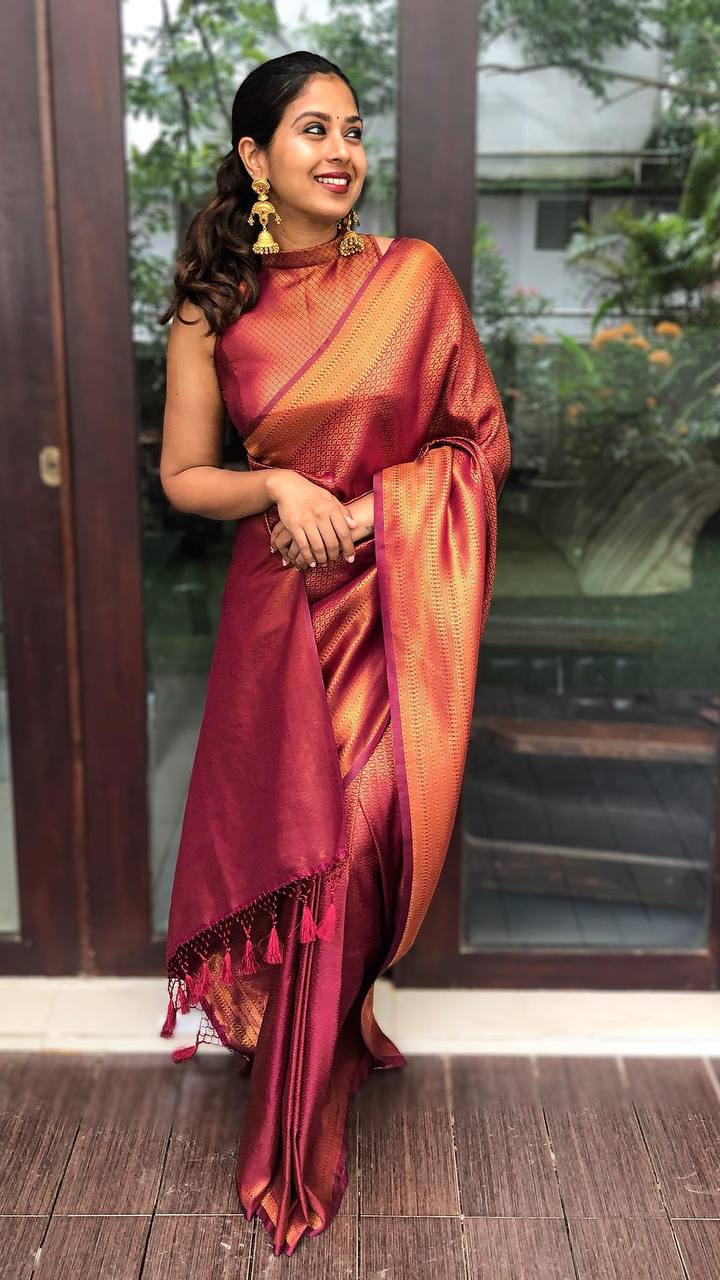 Piquant Wine Soft Banarasi Silk Saree With Magnificat Blouse Piece