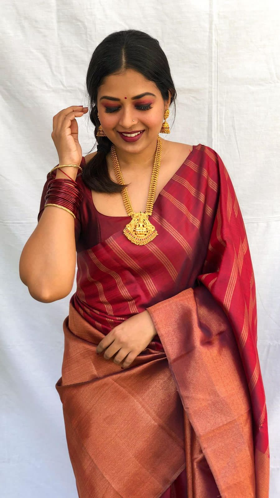 Aplomb Maroon Soft Banarasi Silk Saree With Prominent Blouse Piece