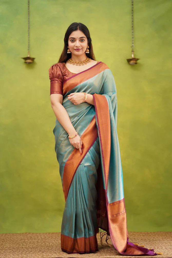 Splendorous Firozi Soft Banarasi Silk Saree With Ephemeral Blouse Piece