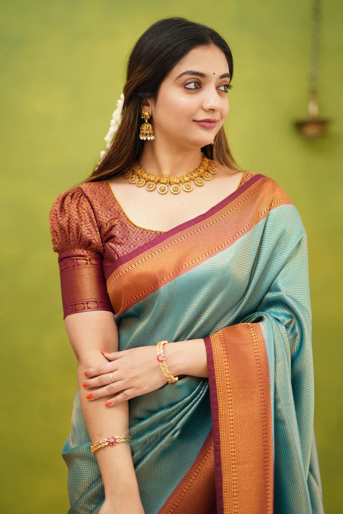 Splendorous Firozi Soft Banarasi Silk Saree With Ephemeral Blouse Piece