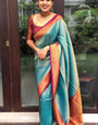 Enthralling Firozi Soft Banarasi Silk Saree With Innovative Blouse Piece