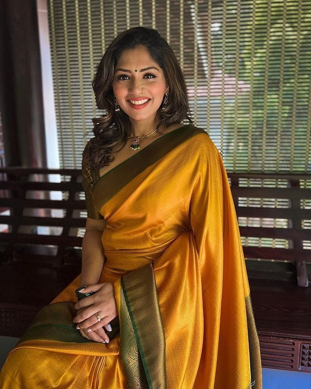 Rhapsodic Yellow Soft Silk Saree with Lissome Blouse Piece