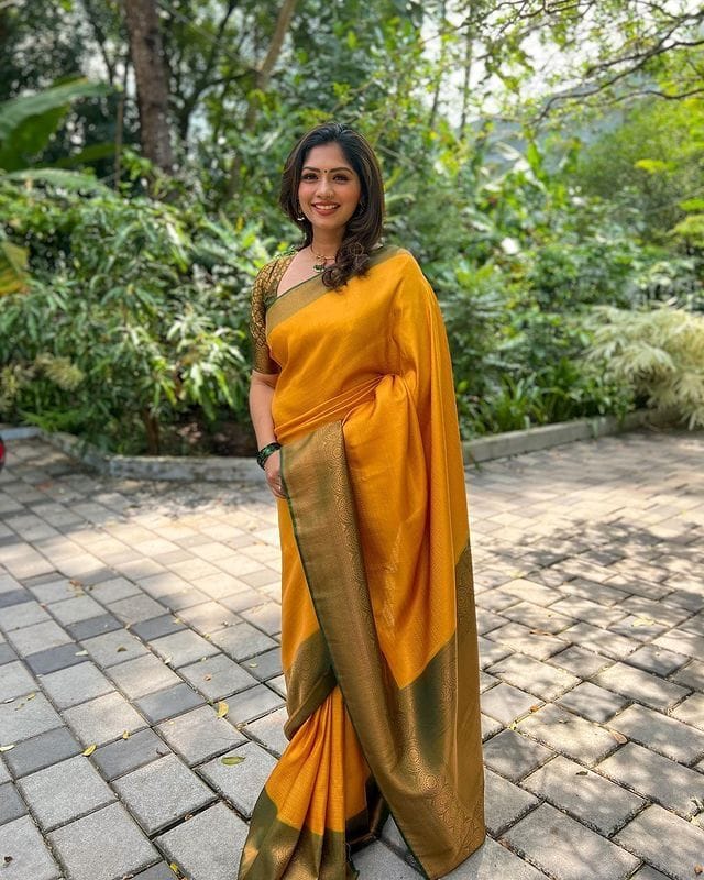 Rhapsodic Yellow Soft Silk Saree with Lissome Blouse Piece