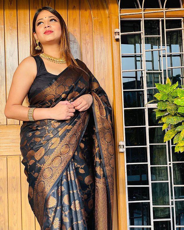 Evocative Black Soft Banarsi Silk Saree With Designer Blouse Piece