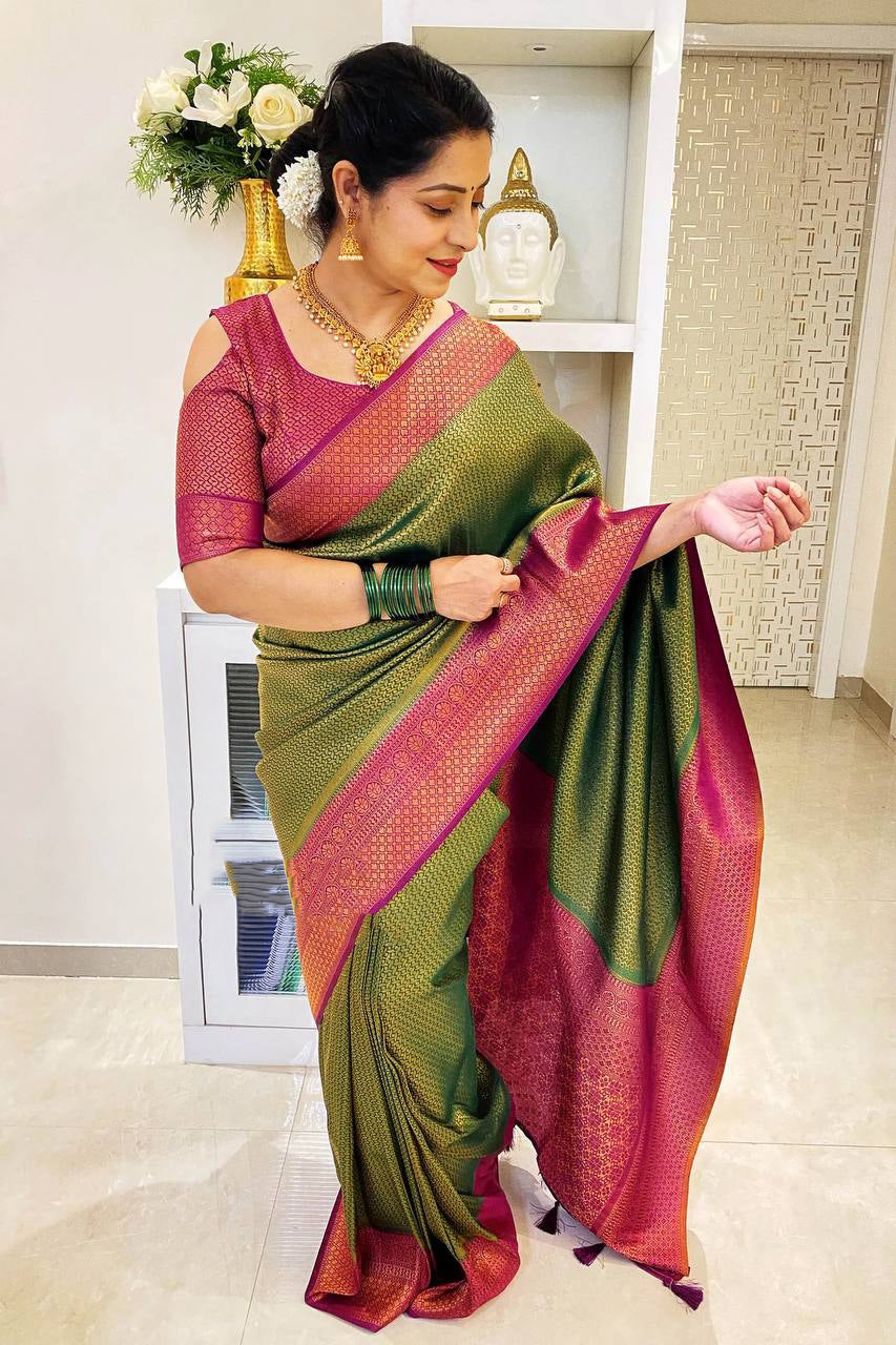 Vibrant Green Soft Silk Saree With Surreptitious Blouse Piece