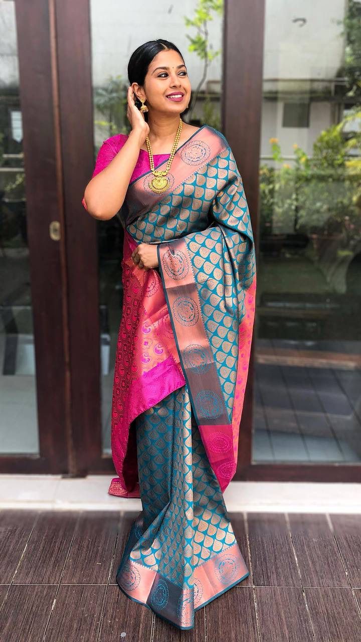 Fugacious Rama Soft Banarasi Silk Saree With Dazzling Blouse Piece