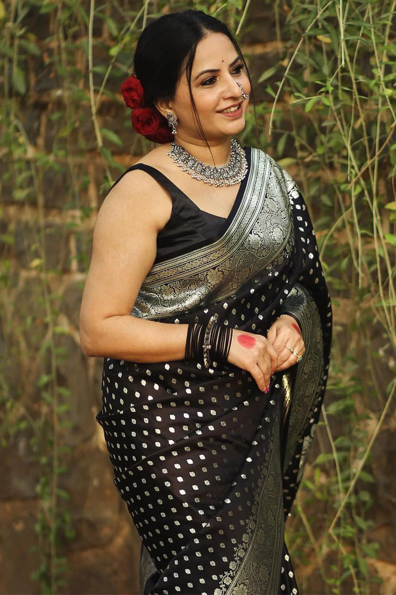 Pulsating Black Soft Silk Saree With Exceptional Blouse Piece