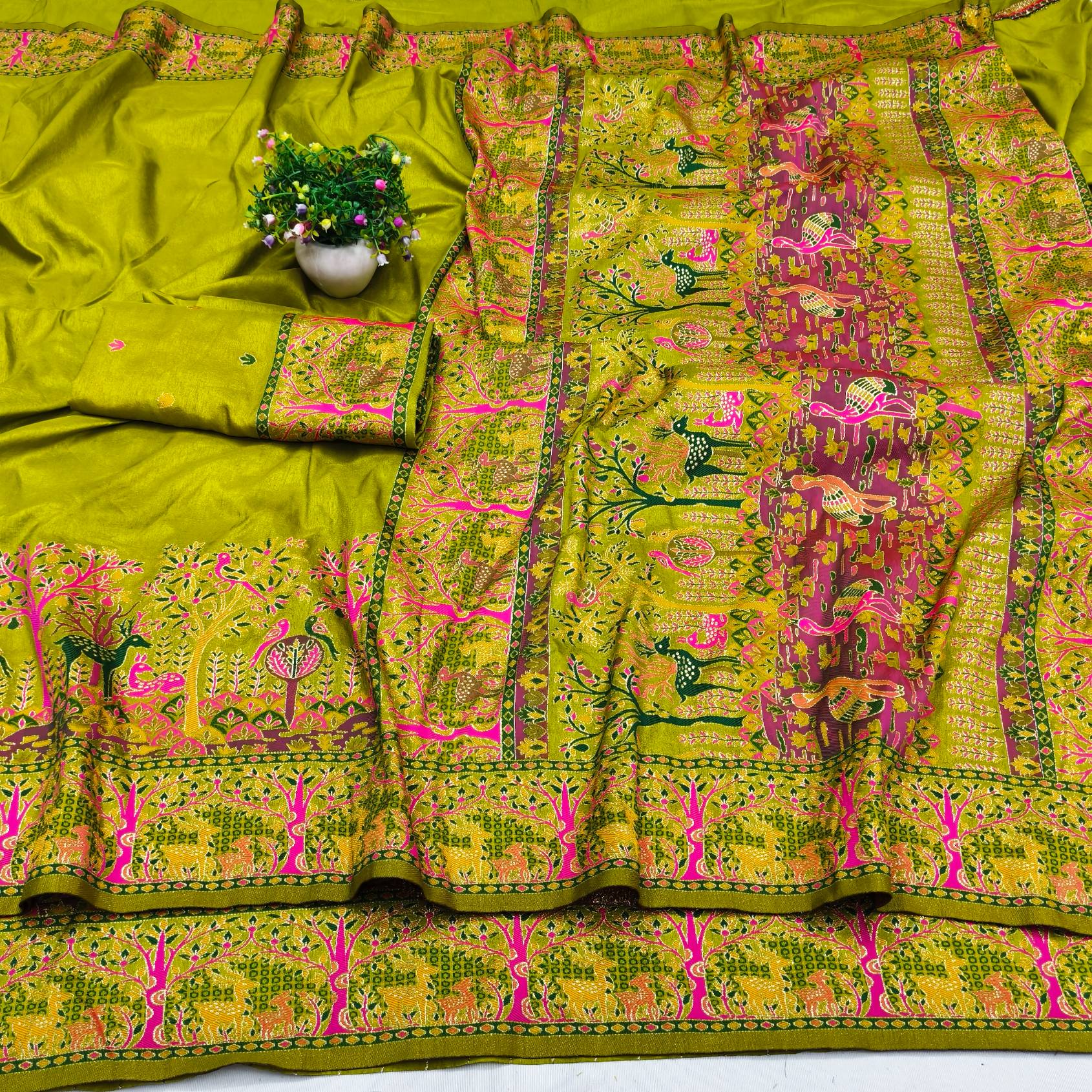 Rhapsodic Mehandi Nylon Dola Pashmina Saree With Stunner Blouse Piece