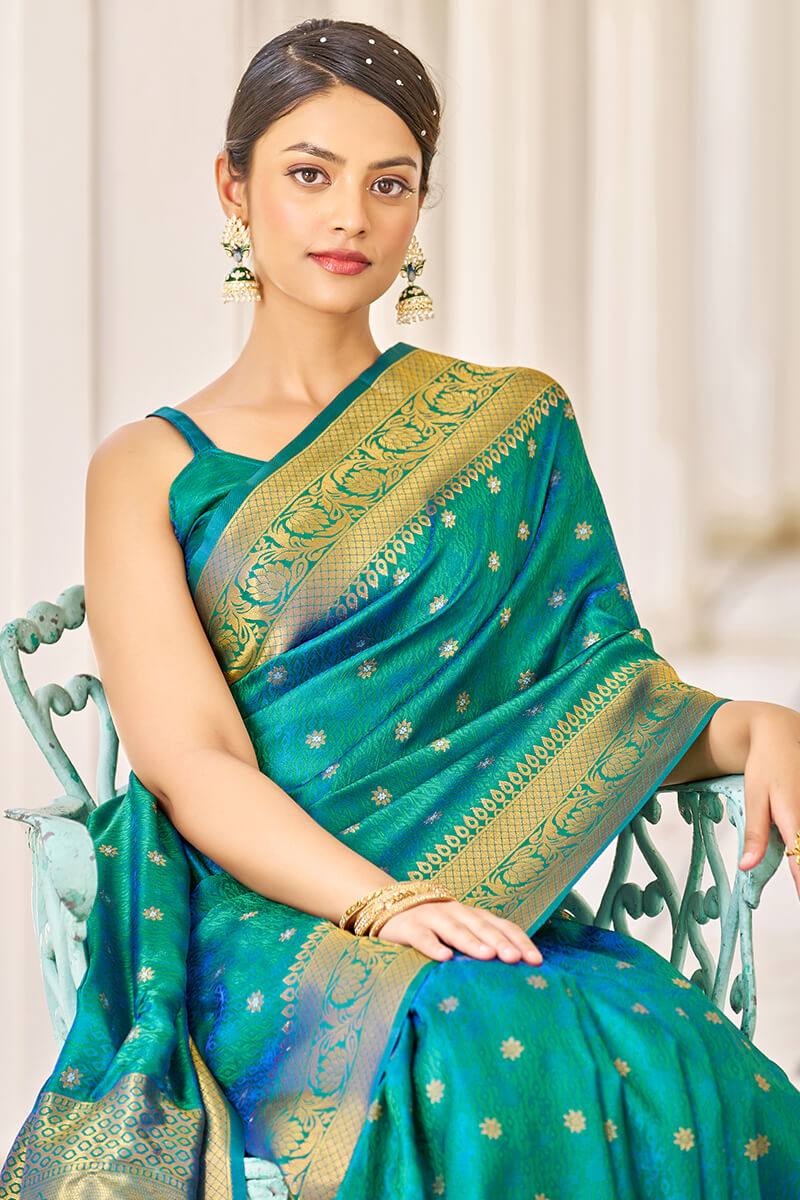 Eclat Rama Kanjivaram Silk Saree With Majesty Blouse Piece