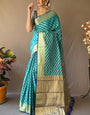 Conflate Firozi Soft Banarasi Silk Saree With Ebullience Blouse Piece