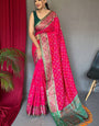 Innovative Dark Pink Patola Silk Saree with Opulent Blouse Piece